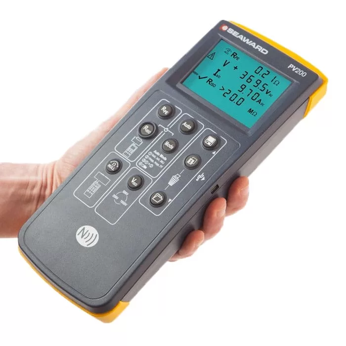 solar string tests Handheld PV test instrument in use at a string termination, recording voltage and current readings