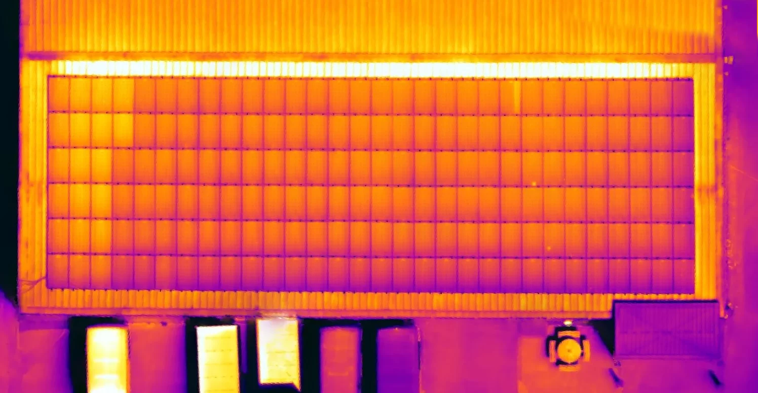 Commercial solar PV array on farm building roof