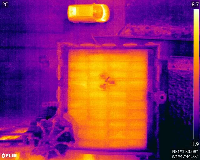 Thermal roof inspection Drone view of a commercial roof showing ridges, valleys and gutters in sharp detail before winter