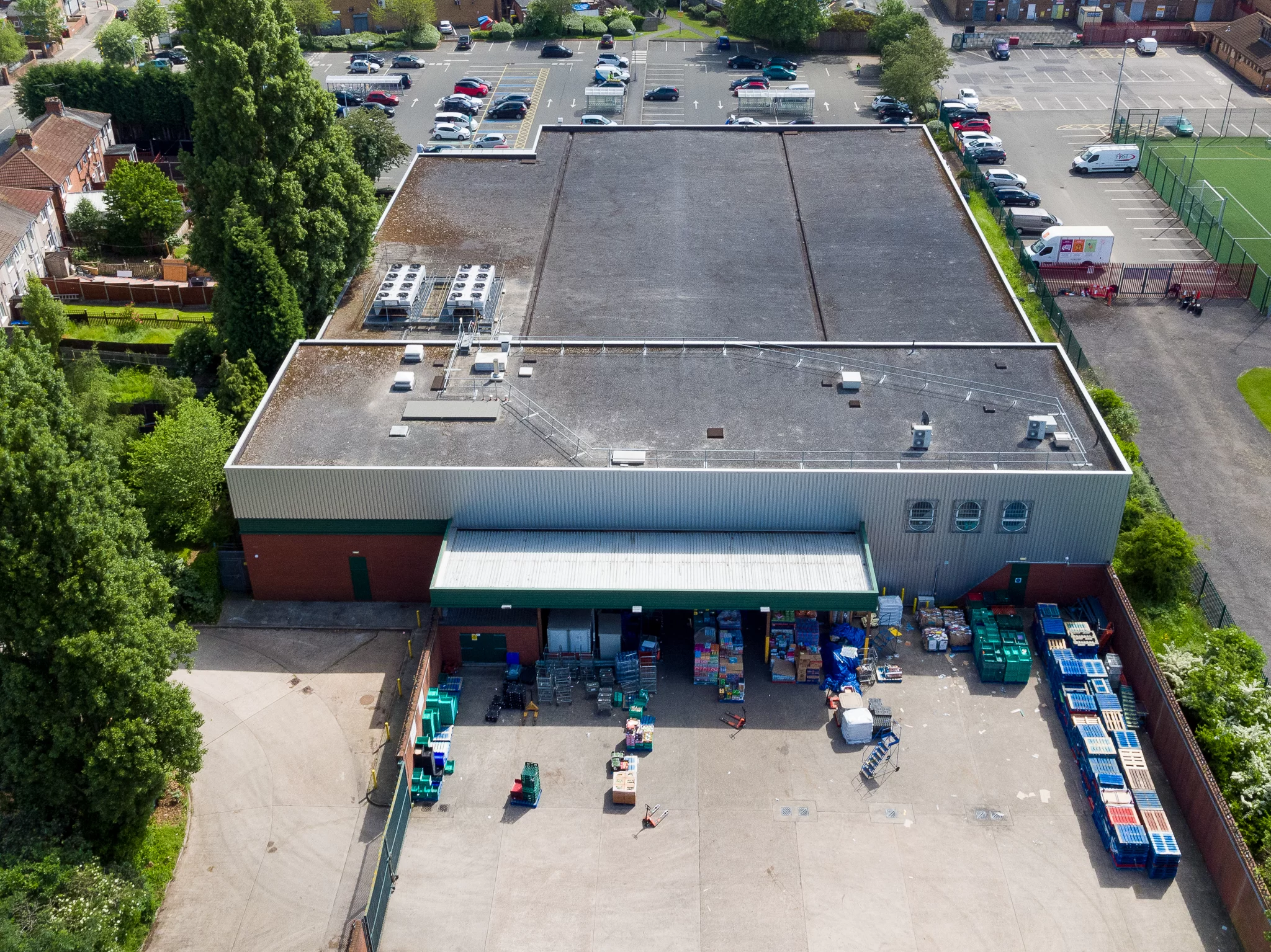 Commercial building portfolio roof surveying in Kent Thermal image of a residential block elevation recorded from the air during a portfolio survey